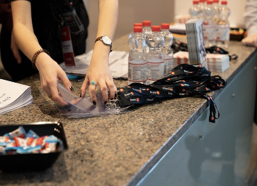 Welcome desk with badges during a scientific conference
