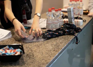Welcome desk with badges during a scientific conference