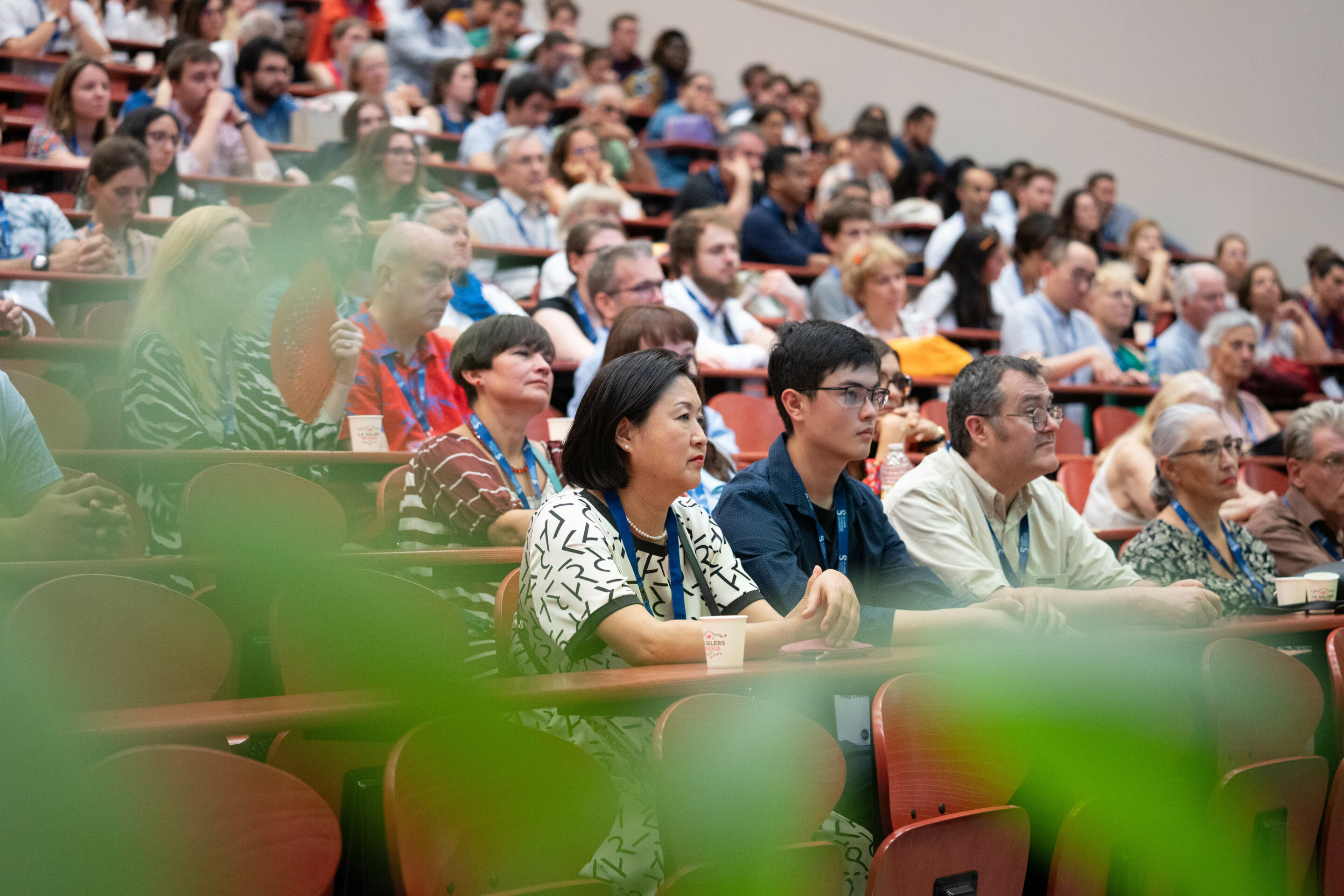 People in an auditorium during an institutional event